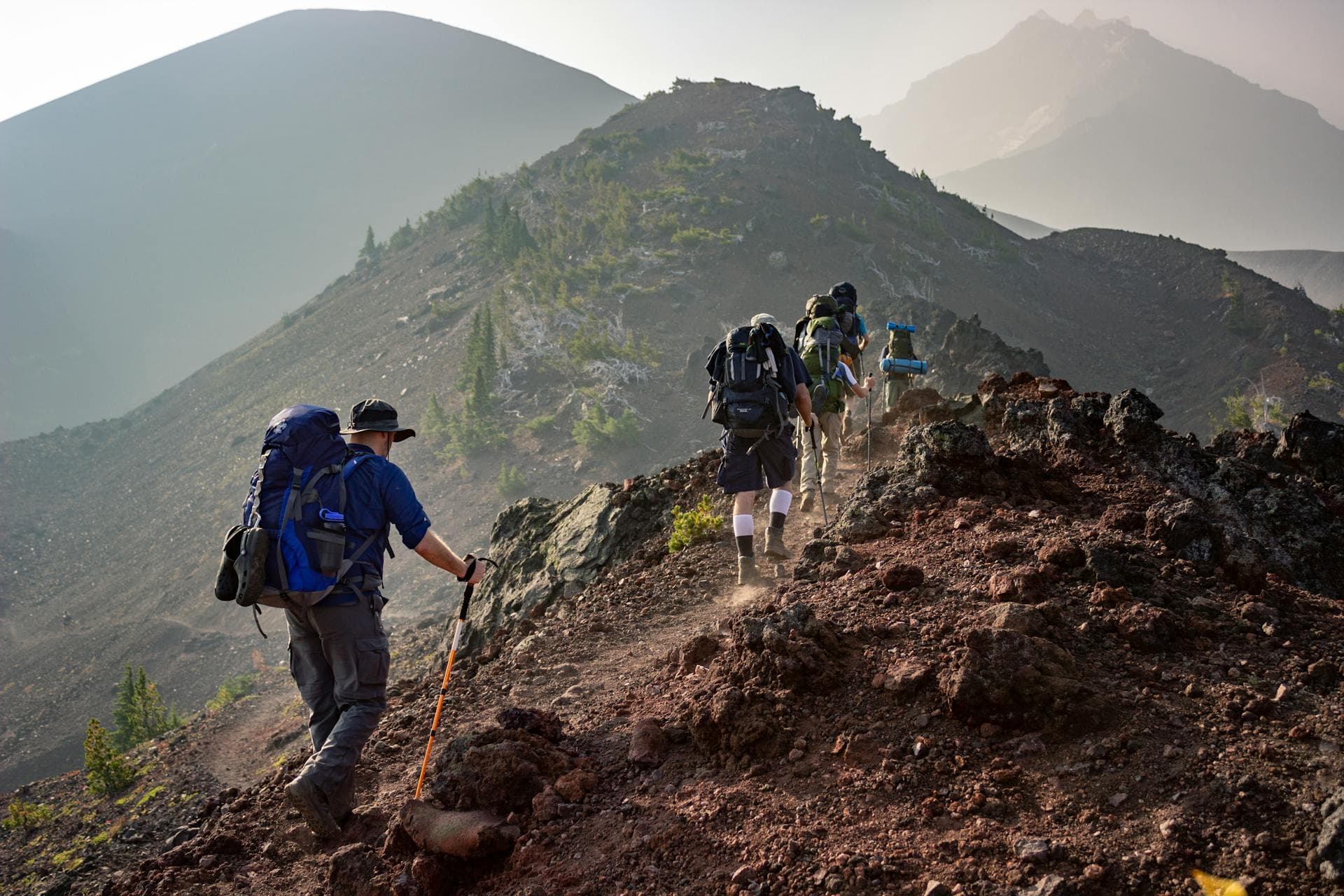 People hiking through the mountains