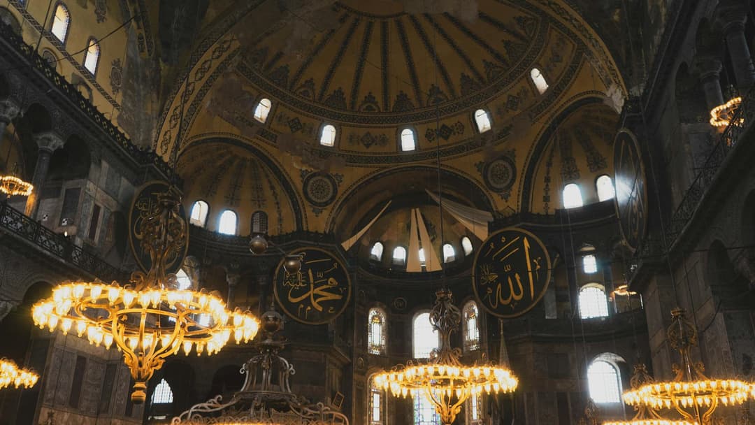 Chandeliers and arabic writings from inside the Hagia Sophia