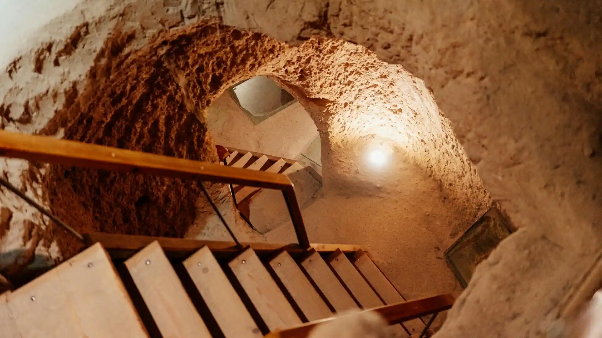 Stairs descending into the depths of the underground city in Cappadocia.